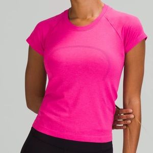 Pink or Red Lulu shirt Size 6 or 8 - I cut the tags out and can’t remember